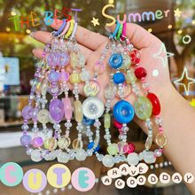 新款遇光变色手机链扣创意时尚包包挂链圆形跨境爆款串珠手机挂件