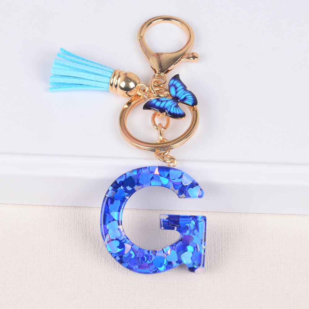 Cross-border Hot Sale 26 letras inglesas llavero de resina de goteo de goma esquinilla llavero de letras de amor personalizado