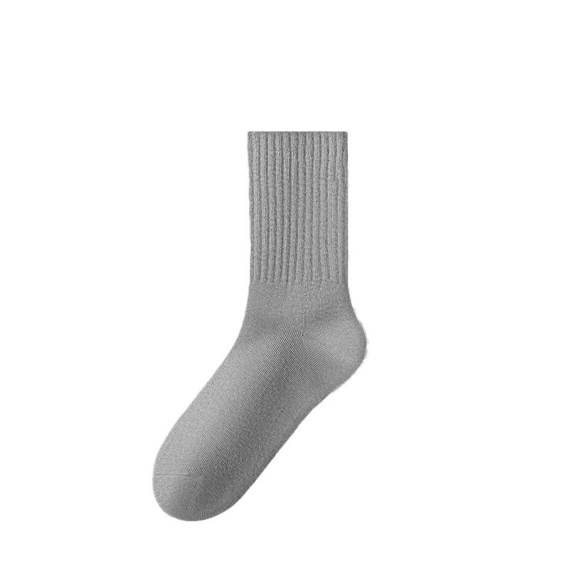 Mujeres primavera y verano, calcetines verticales, calcetines deportivos antibacterianos al por mayor, calcetines de mujer sin hueso de color sólido.