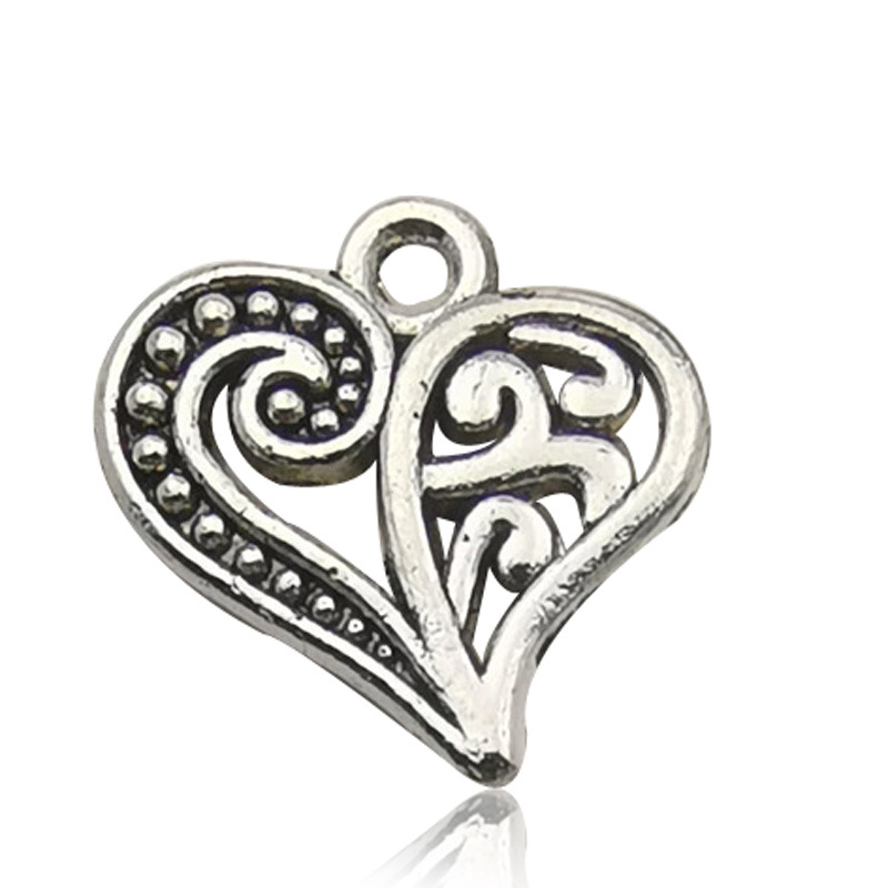 13340-0.7g13x12 Corazón de melocotón plata antigua