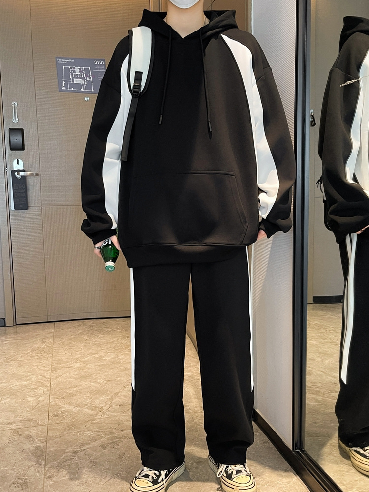 Primavera y otoño nuevo conjunto de dos piezas de chaqueta con capuz para niños jóvenes sueltos tendencia de hombre guapo con un conjunto completo