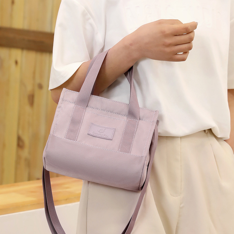 Bolsos de mujer de nylon impermeables transfronterizos, bolsos de moda y sencillos, bolsos de personalidad, compras ligeras, bolsos de hombro único portátiles