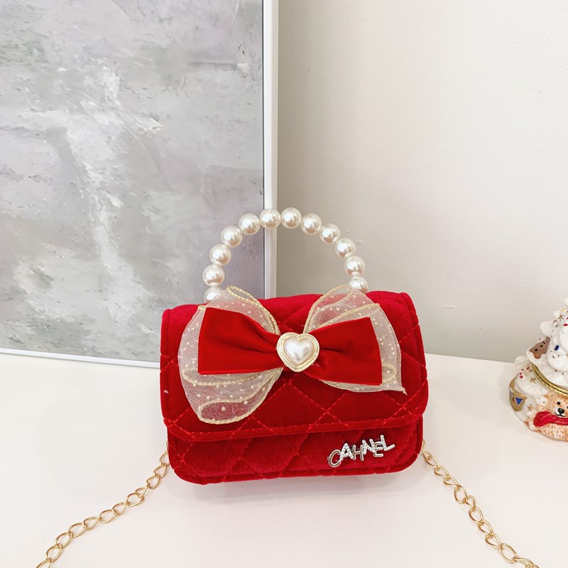 Bolso de niños nuevo bolso de perla rojo de Año Nuevo lindos princesas niñas bolso de hombro de cadena de estilo extranjero bolso de mochila