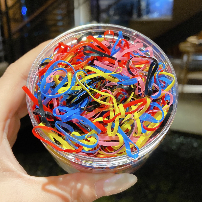 Banda de goma desechable de color cubierta de cuero cabeza de lazo elástico alta banda de goma pequeña hembra negro adulto niños pelo cuerda banda de pelo al por mayor