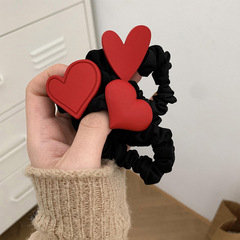 Santa-themed red heart hair tie with French style, versatile and high elasticity, perfect for New Year hair accessories
