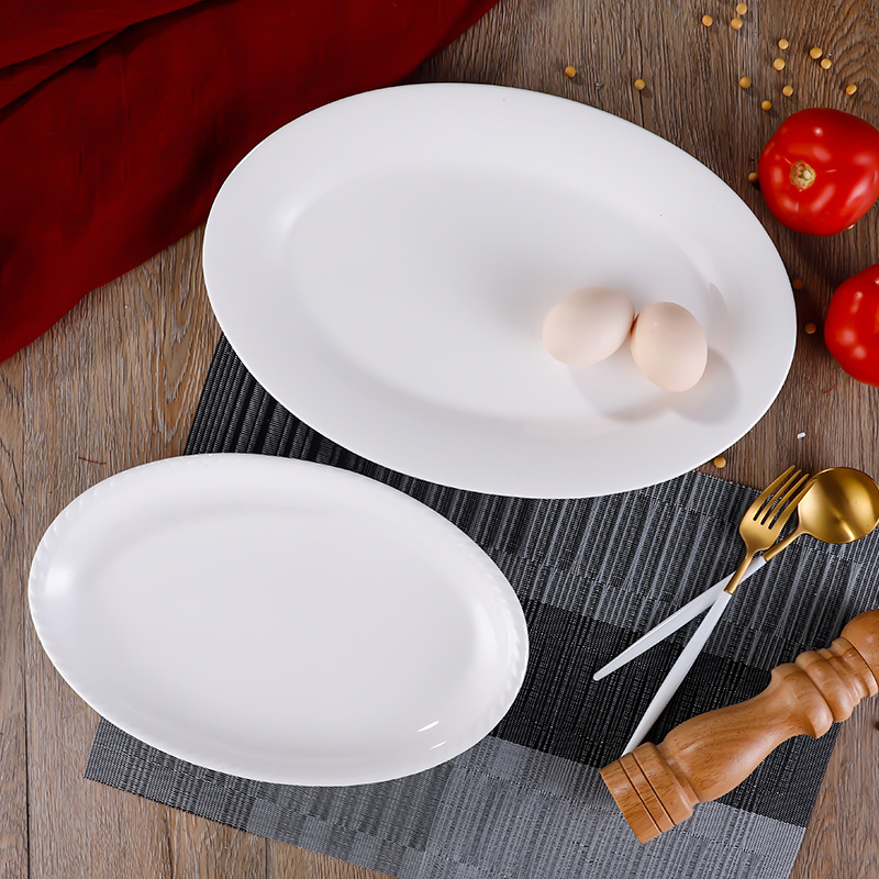순수한 흰색 세라믹 생선 접시 서양 접시 특별한 모양의 찐 생선 접시 가정 요리 호텔 레스토랑 타원형 접시 창조적 인 식기