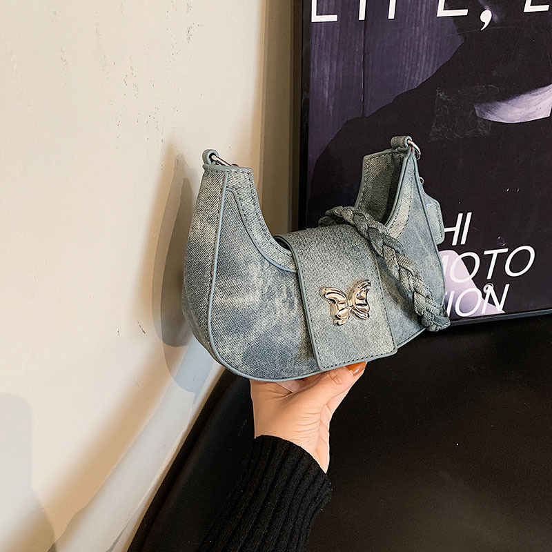 Bolsos de nicho populares para mujer 2024 invierno nueva cadena de moda simple bolso de hombro casual coreano bolso de luna nueva para mujer