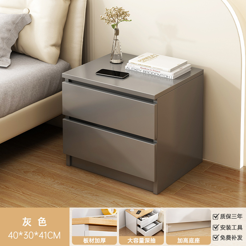 Mini meseta de cabezal de cama dormitorio doméstico 2026 nuevo armario de almacenamiento simple gris de lujo ligero de alta calidad armario de almacenamiento junto a la cama