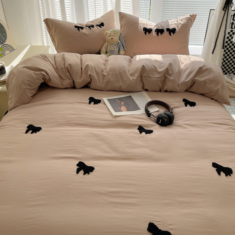2024 nuevo estilo suave lazo toalla bordado nube lavada algodón funda edredón de cuatro piezas sábana sábana sábana simple y elegante