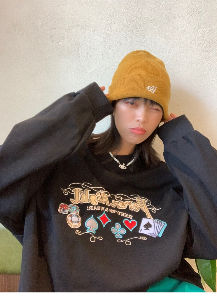 Sweater showcasing embroidery details