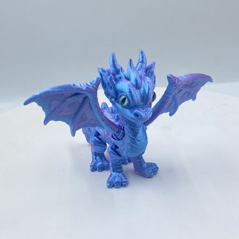 3Dプリントされたかわいい西洋のドラゴンの羽と尾は縮めたり動かしたりできる関節が付いており、子供向けのギフト、おもちゃ、モデルの装飾品です。|undefined