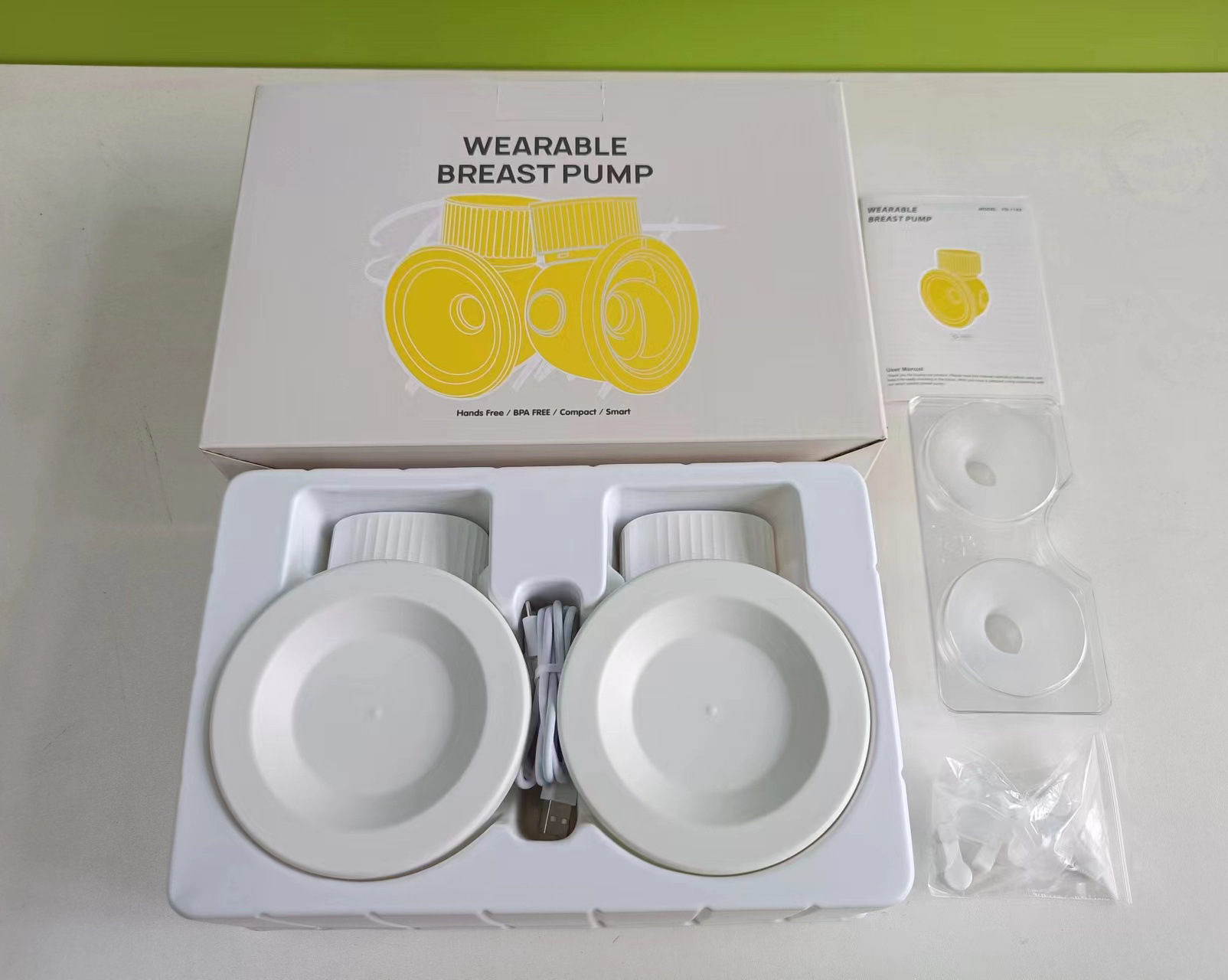 Bomba de leche eléctrica portátil todo en uno bomba de mama eléctrico portátil al por mayor bomba de mama portátil automático