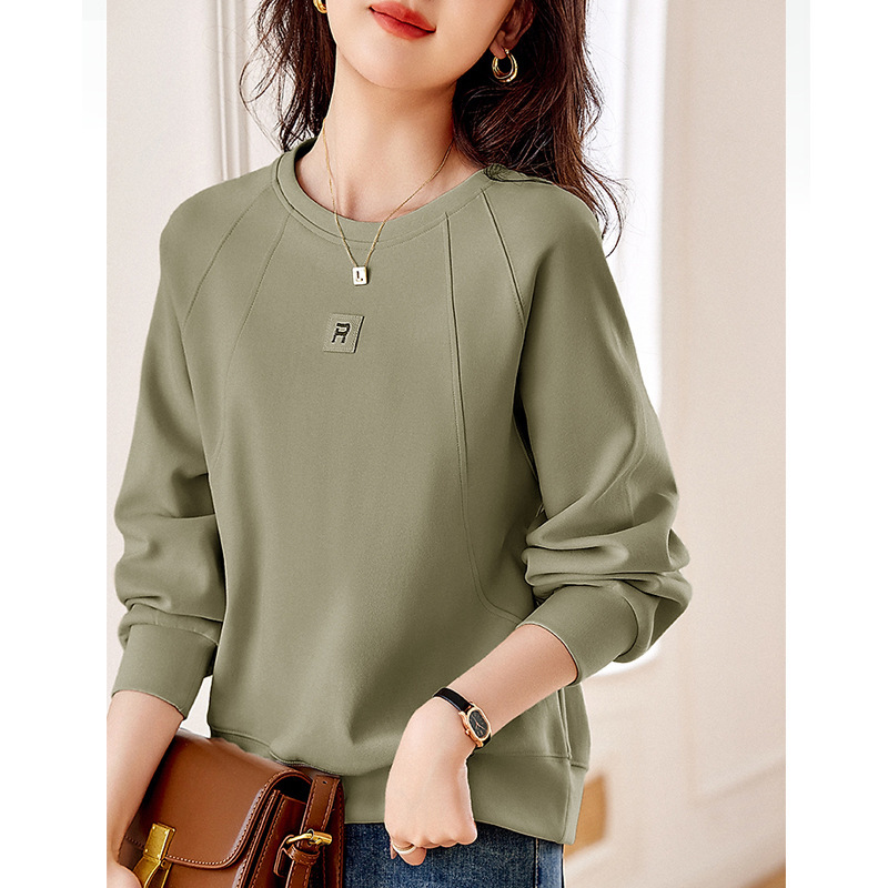 Fashion design sense sweater women's 23 years autumn new mogo fish yuanchuang leisure style Joker round neck loose-fitting top