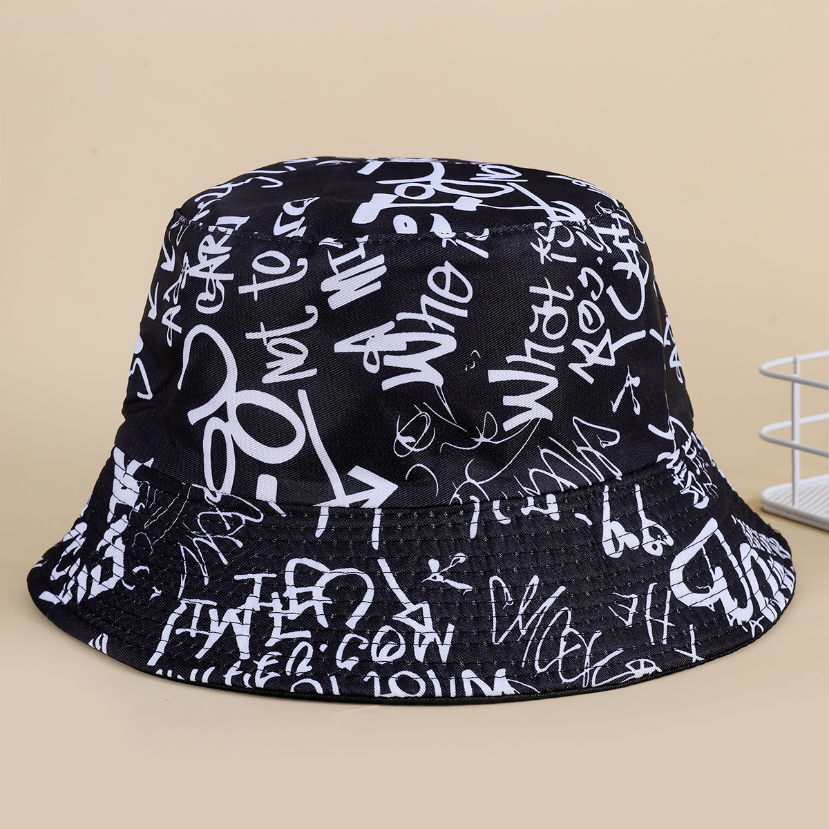 Sombrero de pescador sombrero de lavabo femenino Comercio exterior nuevas letras y números graffiti impresión personalizada sombrero de Sol de doble cara pareja Moda