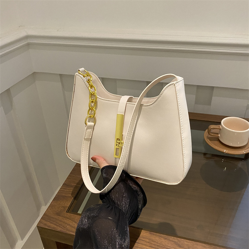 Bolsos pequeños de diseño de nicho populares de este año para mujer 2024 otoño nuevo bolso de mensajero de moda bolso de hombro de moda bolso de axila