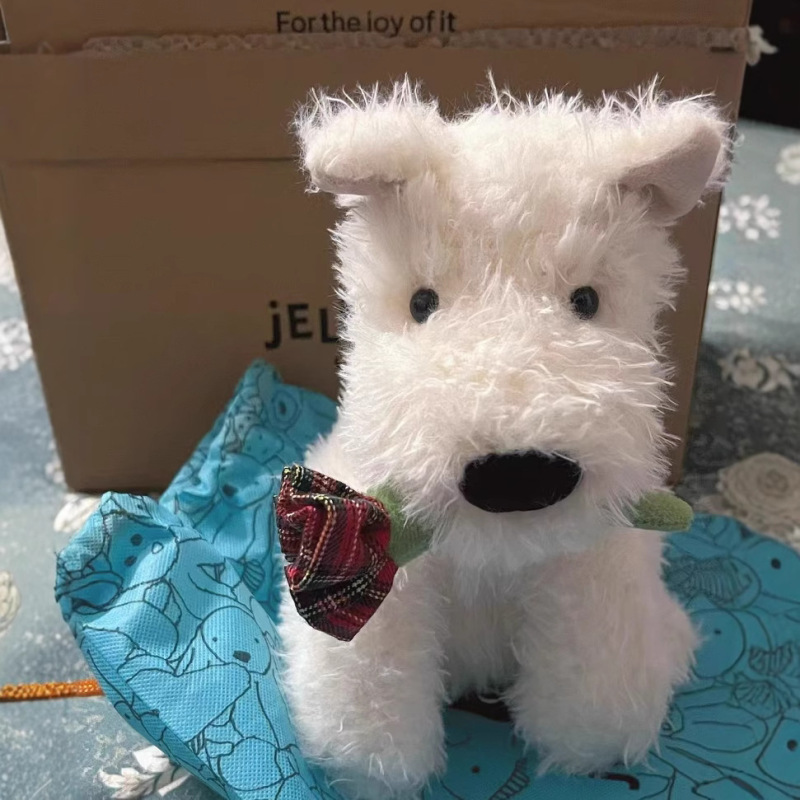 国産ジェリーキャットと同じスタイルの花を抱えたウェストハイランド・テリアのバレンタインデー用のかわいいぬいぐるみ、車の鍵のギフト|undefined