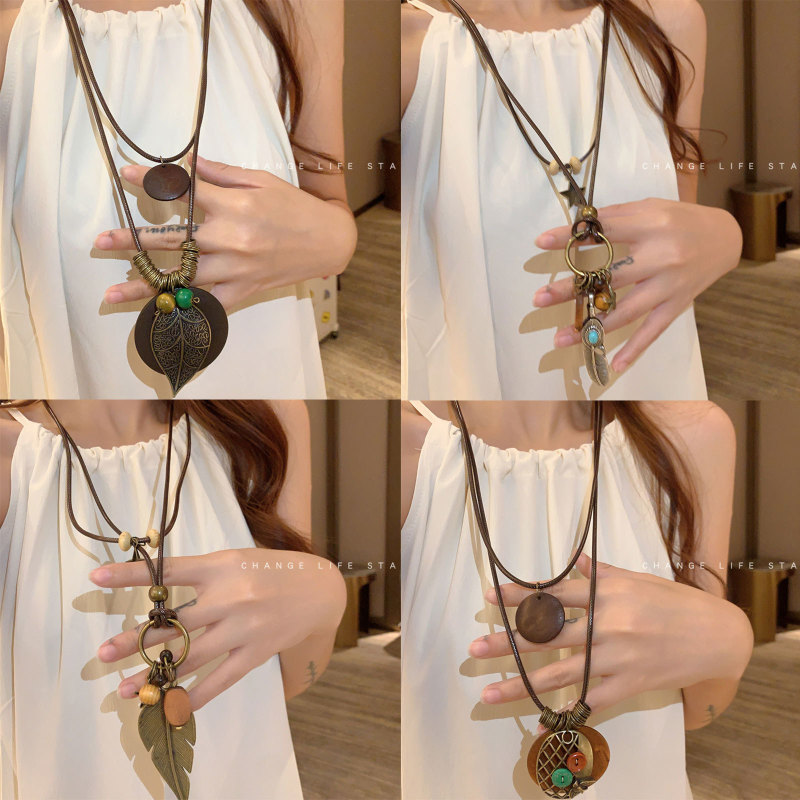Chinese style Mori versatile artistic retro ethnic style necklace feather life tree pendant sweater chain hanging accessories