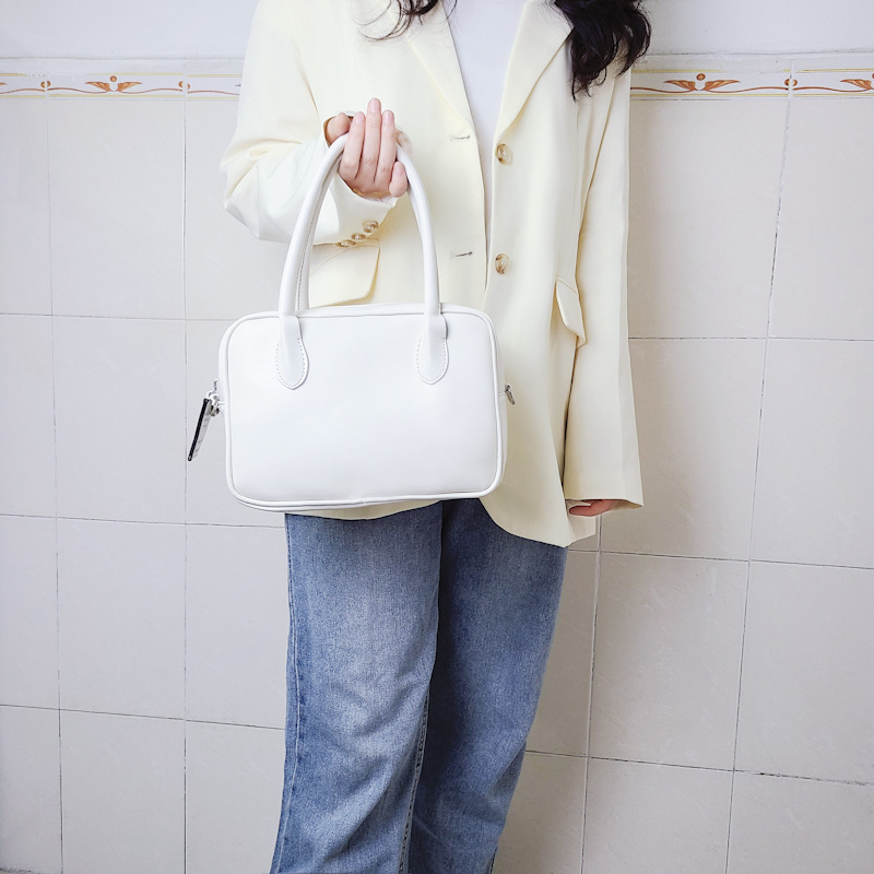 Design di nicchia coreano con la stessa borsa color crema e una borsa elegante, borsa quadrata con croce diagonale a spalla singola_voghion.com