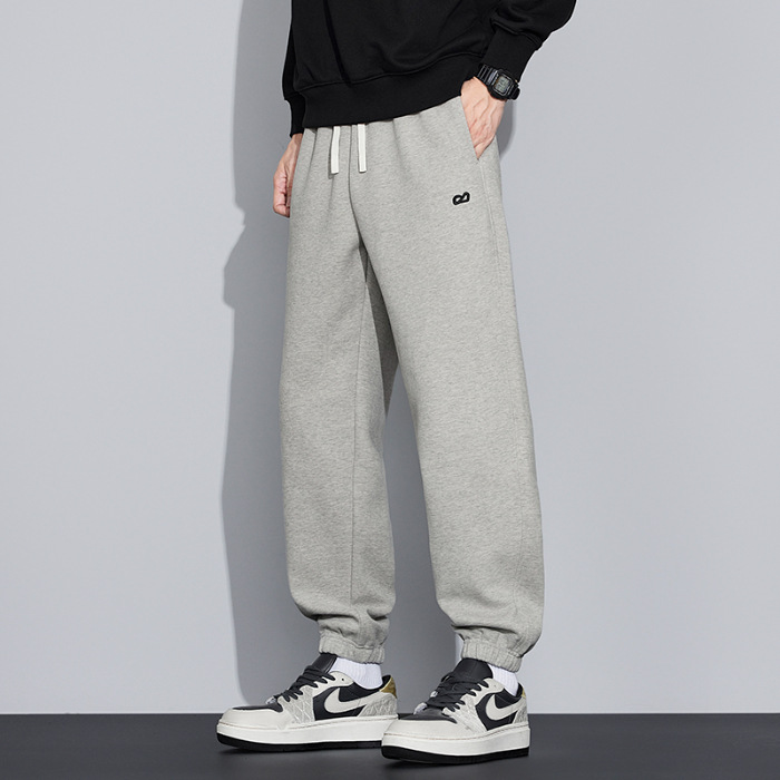 2025 nuevo estilo primavera y otoño suelto pie rectas bordado pantalones masculinos japoneses retro suelto pantalones de tendencia versátil