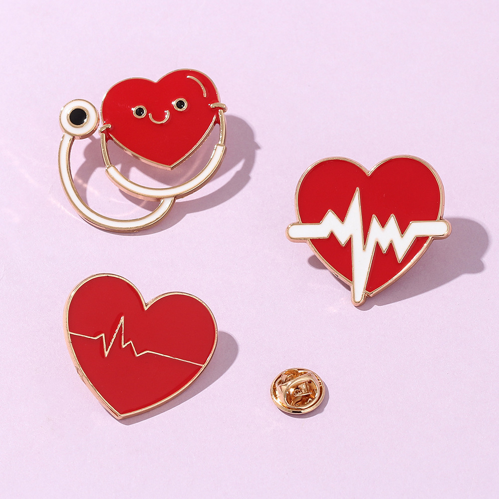 Europeo y americano joyería serie médica metal esmalte broche estetoscopio ECG masculino y femenino doctor enfermera insignia