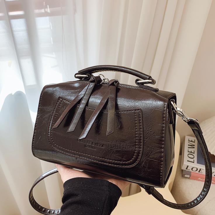 Bolso de mano de tendencia retro para mujeres 2025 nuevo diseño versátil bolso de almohada transfronterizo simple alta sensación mochila