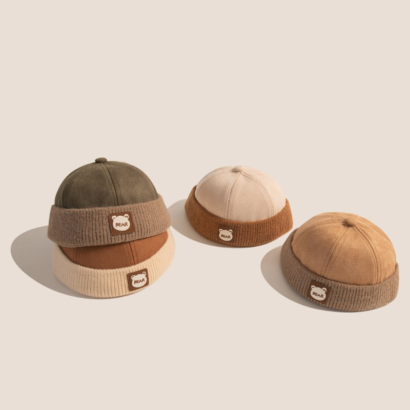 Otoño y invierno coreano estilo exterior sin bordes de color engrosado sombrero de niños para hombres y mujeres bebés caliente sombrero de piel de melón de moda universal