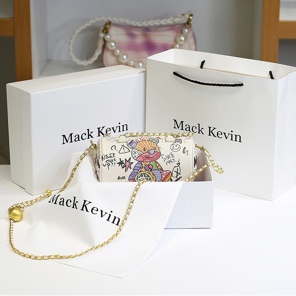 Bolso de mujer transfronteriza bolso de cilindro femenino 2023 nuevo oso graffiti cadena bolso de hombro bolsa de mensajero