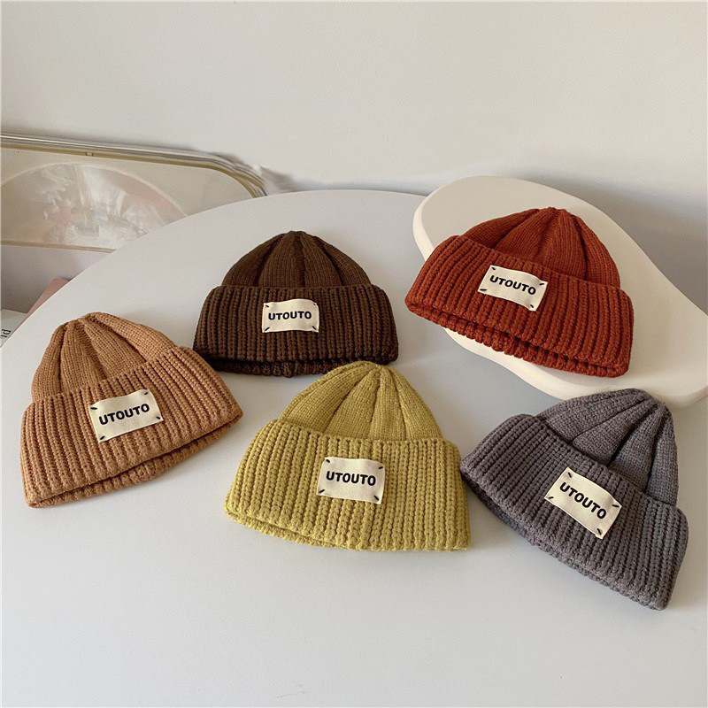 ins bebés coreanos de color sólido extranjero para niños madres y bebés sombreros de lana otoño y invierno estilo coreano sombreros de punto versátiles