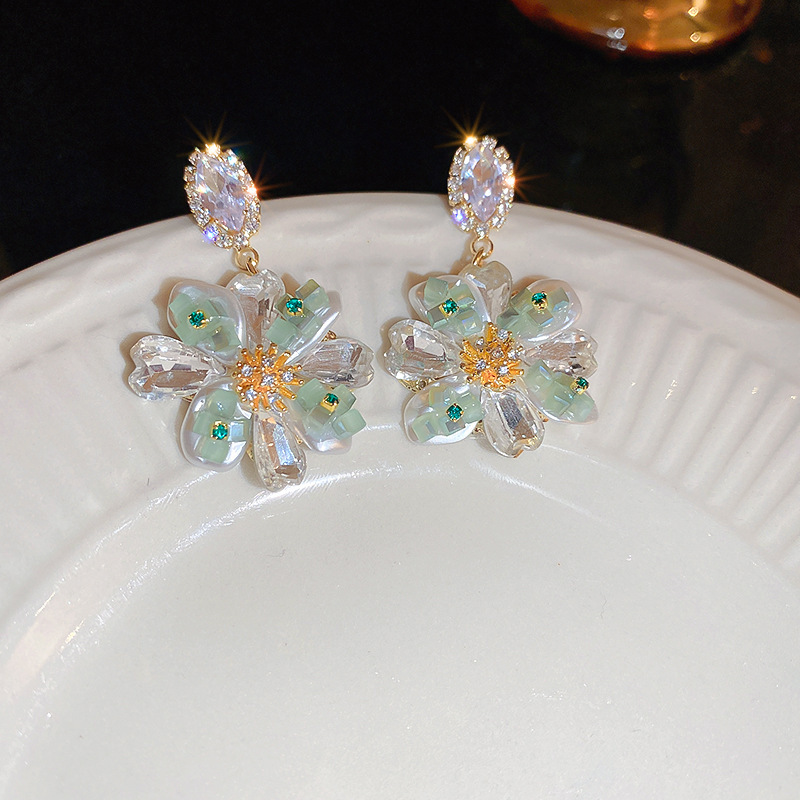 Pendientes de borla de flor de súper hada de plata Pendientes de ins pequeños frescos y dulces Personalidad de moda Pendientes de alta gama al por mayor