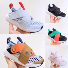 儿童透气大网眼运动鞋2024夏小飞碟交叉带魔术贴防滑童鞋批发轻便