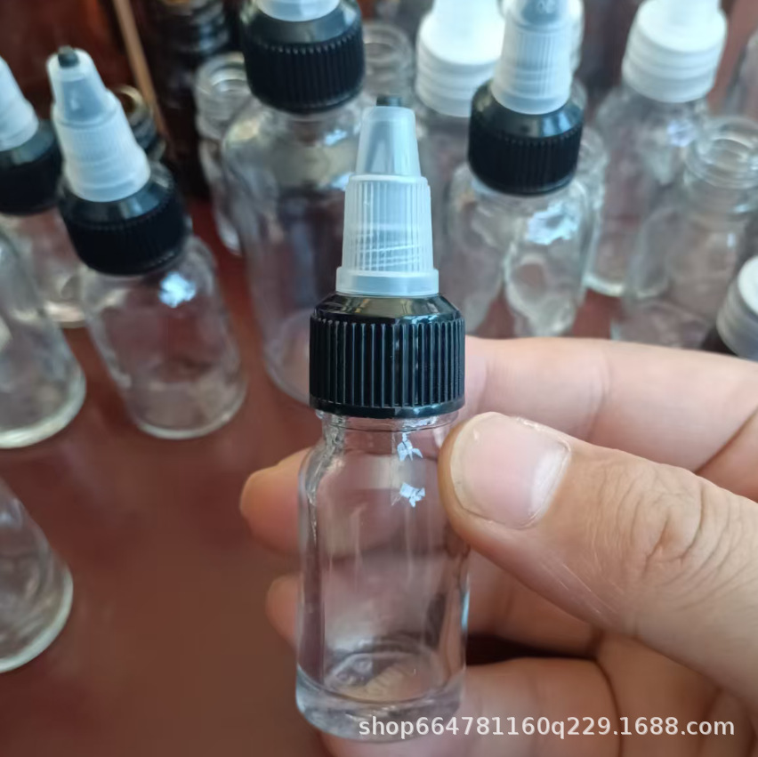 Botella de punta de vidrio Botella de aceite esencial Botella de esencia Botella de agua Botella de solución bruta Botella vacía Botella de goteo de punta rotativa Botella sellada
