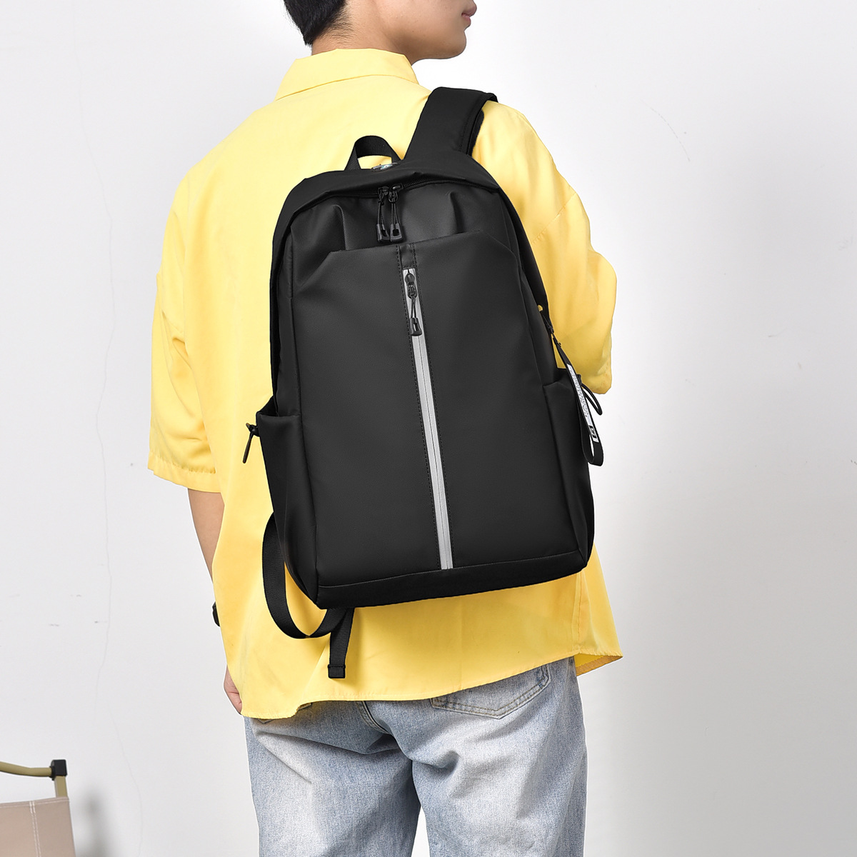 Temporada de viaje personalizada de moda para hombres y mujeres, mochila casual de calidad, mochila ligera y de gran capacidad simple.