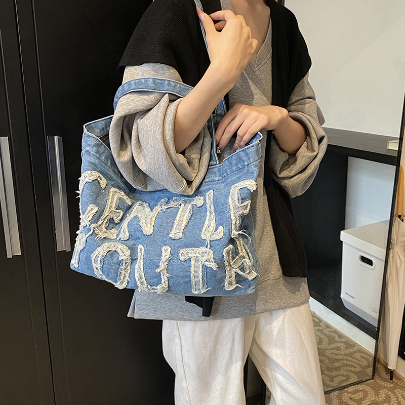 Bolsa de denim de gran capacidad para mujeres 2024 temperamento retro ocio clase de viaje de hombro inclinado bolso inferior