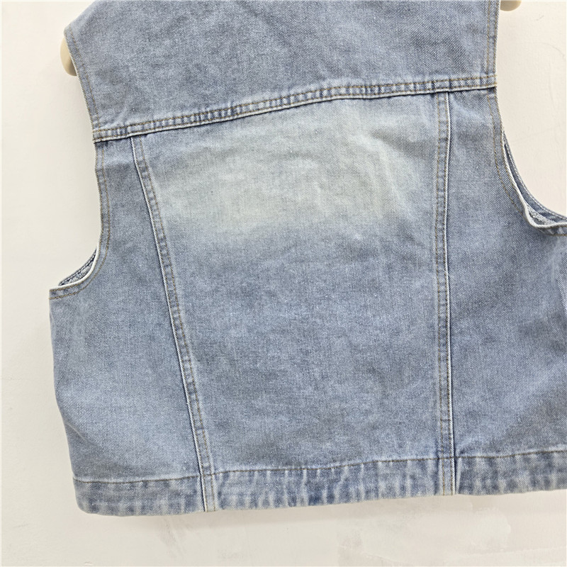 Estación europea 2026 primavera y verano nuevo diseño de industria pesada con bordas de diamante sin mangas corto chaleco de vaqueros chaqueta de mujer
