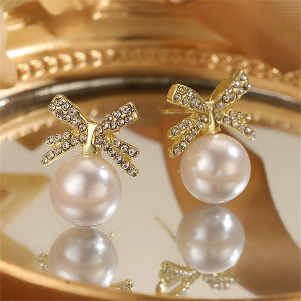 Pearl bow earrings, Japanese‑Korean style, rhinestone‑encrusted, lightweight 0.01 kg
