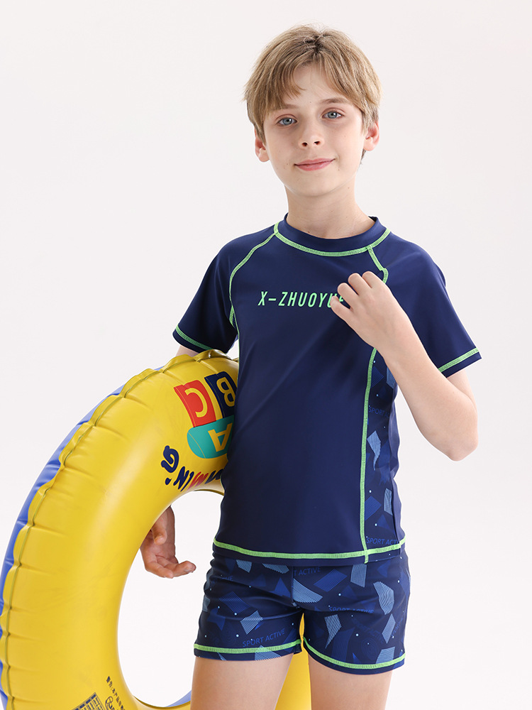 Alrededor de 2026, un nuevo traje de baño infantil de verano para niños, traje de baño protector solar dividido para niños, traje de baño de secado rápido para niños mayores.