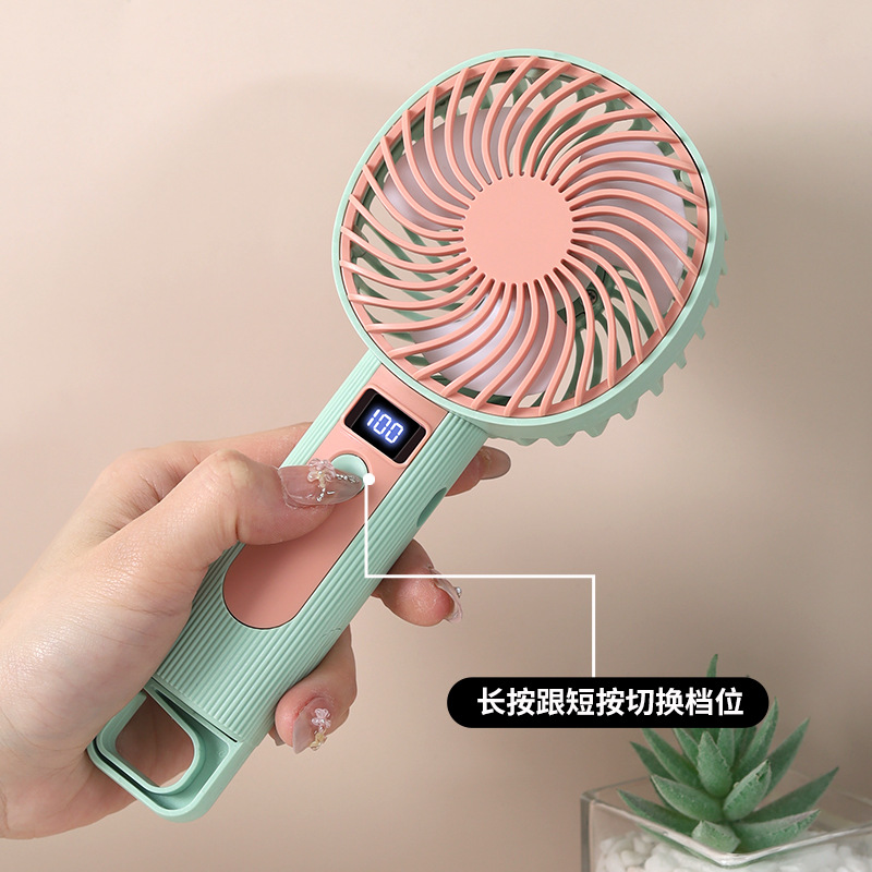Ventilador de mano digital creativo de comercio exterior gancho plegable portátil al aire libre ventilador de escritorio USB de carga ventilador de mano