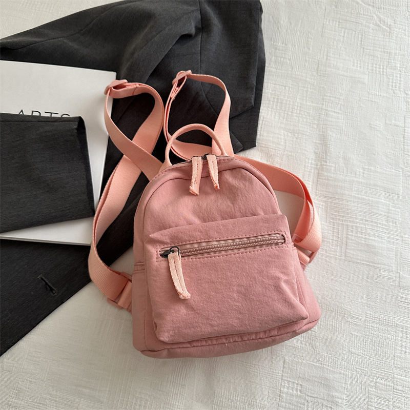 Mochila mini 2026, estilo japonés y coreano, informal, de lona, para estudiantes, de color sólido, versátil, para tabletas