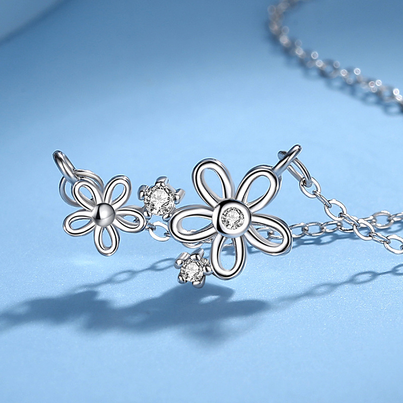 D559 oro blanco (con cadena cruzada)