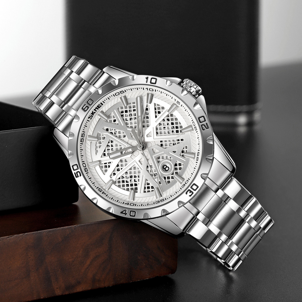 Momento de reloj de hombre redondo hueco correa de acero impermeable calendario reloj de pulsera simple reloj de cuarzo comercial al por mayor transfronterizo