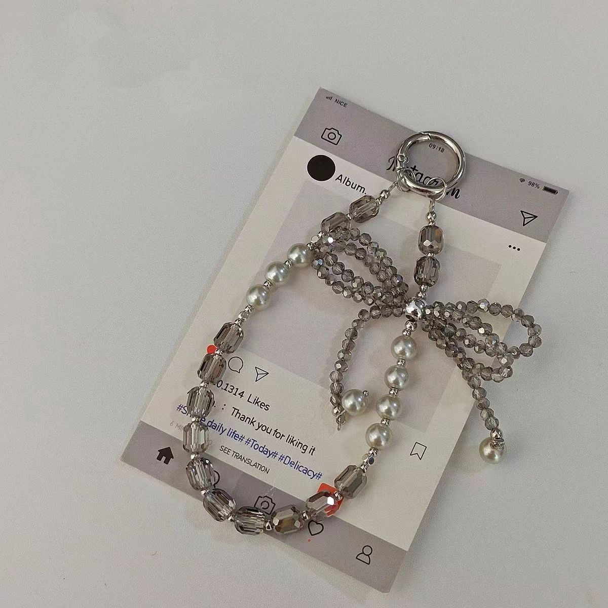 Lazo de perlas de lujo cadena de teléfono móvil cordón de teléfono móvil de alta gama cristal tridimensional corto exquisito cordón de muñeca ins