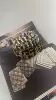 Leopard print bullet belt