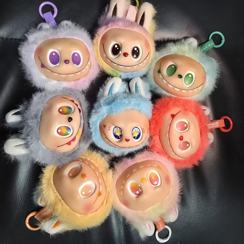 Explosiones de muñecas de llaves de dibujos animados descompresión creativa pellizco juguetes colgantes de estandos de fábrica