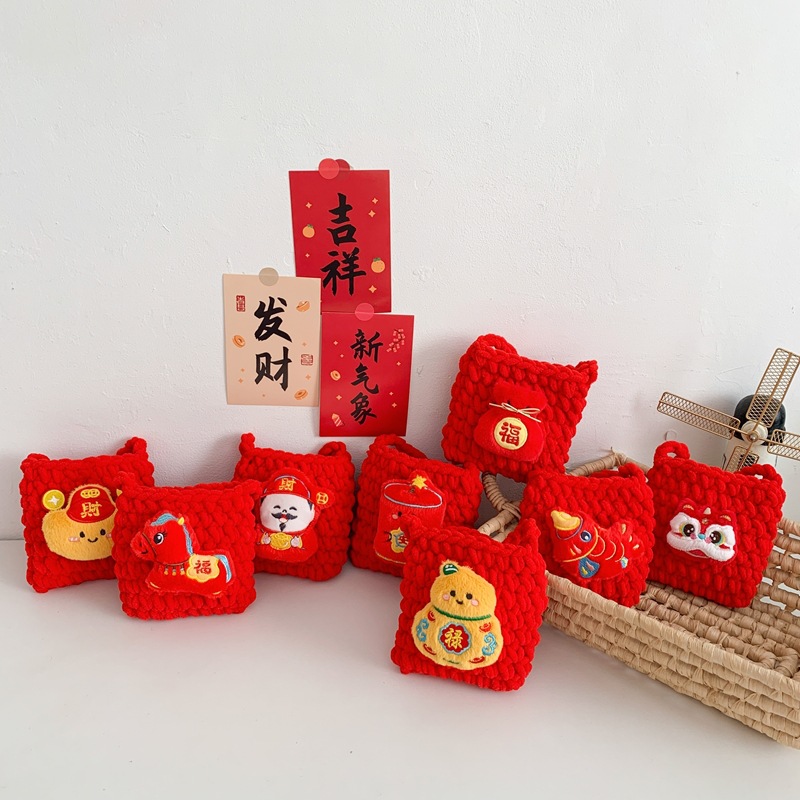 2026 bolsas de Año Nuevo para niños caricaturas lindas bolsas de hombro para niños y niñas ganchos de lana a mano sobre rojo de Año Nuevo