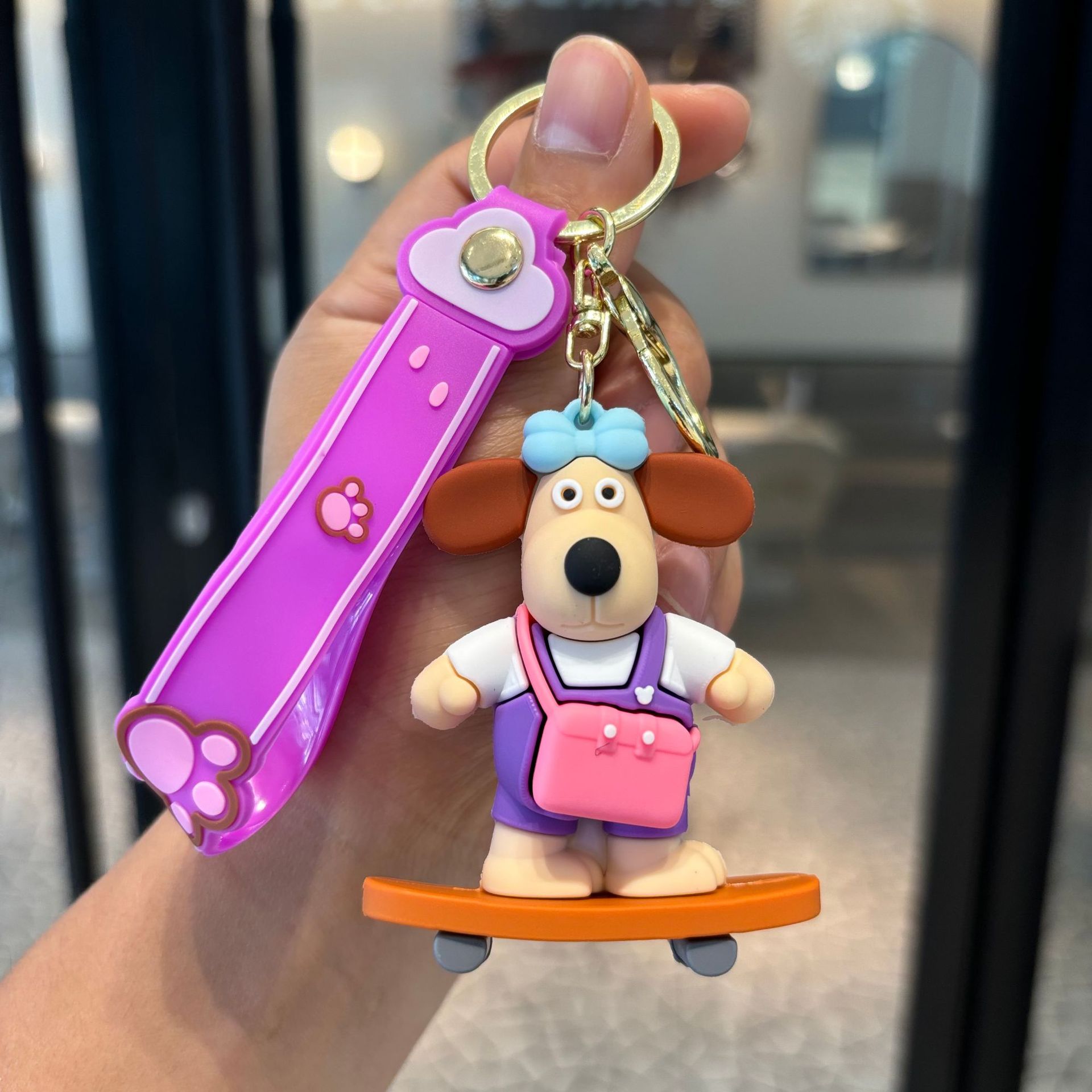 Jefe de perro llavero muñeca colgante llave de PVC pequeño regalo dibujos animados adornos lindos llavero de la máquina