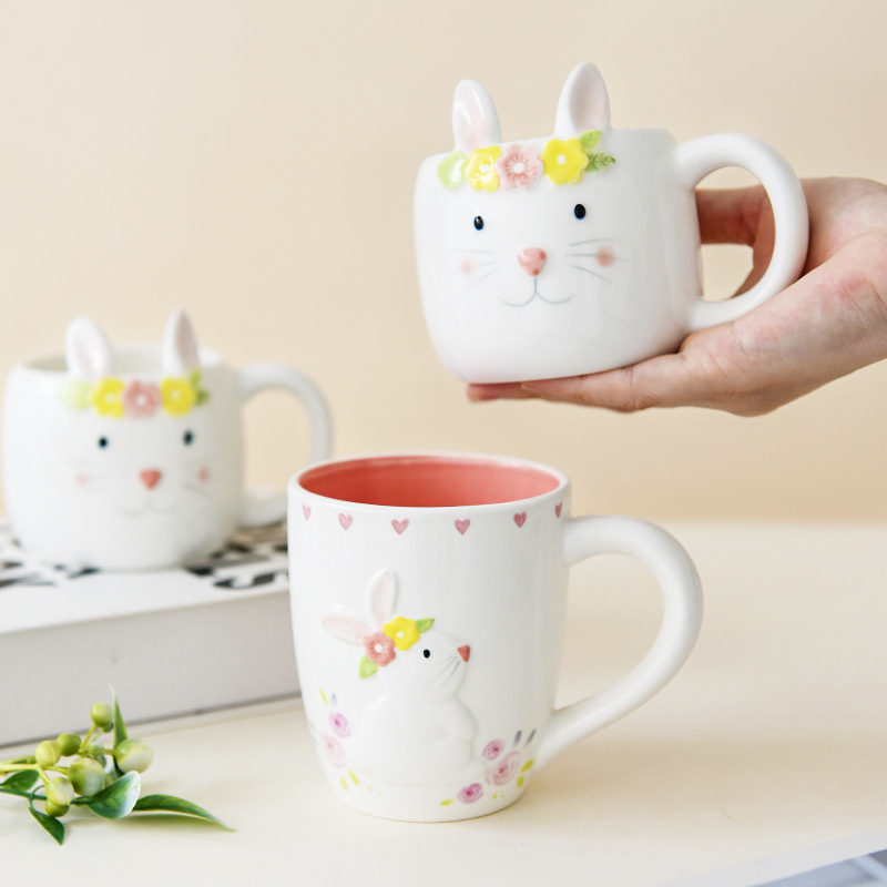 Inventario encantador nórdico conejo taza de agua de cerámica doméstica flores de conejo taza de desayuno de leche de doble cara