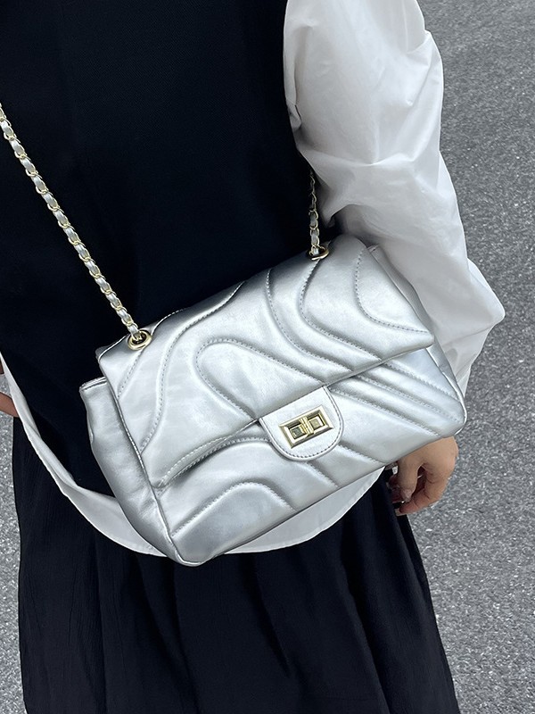 Bolso de cadena de comercio exterior para mujeres 2025, nueva moda bordada bolso de mano, sensación de alta calidad, simple ocio, mochila de viaje