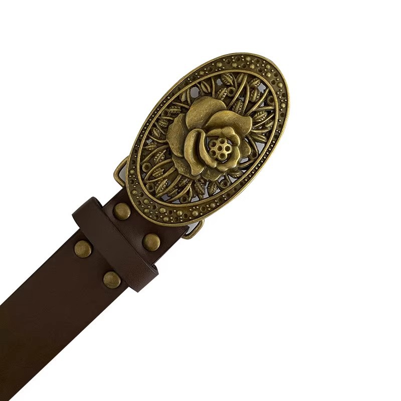 Cinturón de mujer 2025 nuevo estilo de alta sensación con faldas jeans con remaches accesorios de nicho de estilo de tierra de desecho de la moda de cinturón de cuero