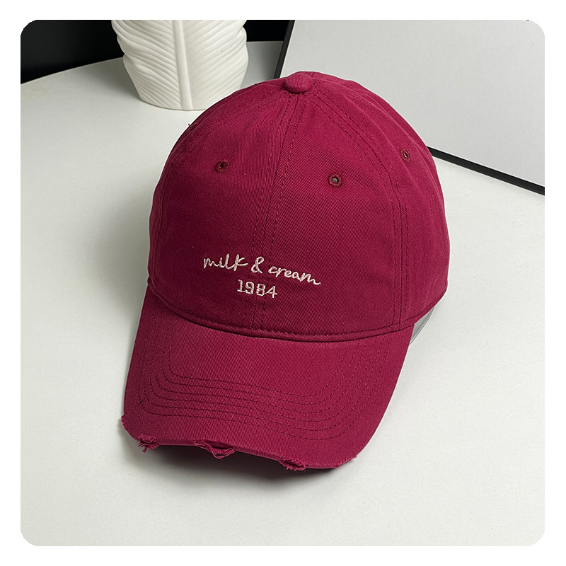 agujero nuevo sombrero de béisbol bordado de letras mujer simple cara pequeña gorra de lengua de goma ancha primavera y verano sombrero de pareja hombre