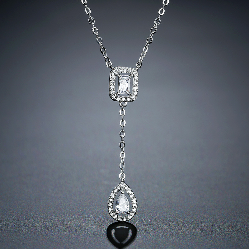 Bracelet et collier minimalistes et élégants, ornés de micro-incrustations de zircon de qualité AAA, en forme de goutte d'eau. Un ensemble de bijoux tendance et polyvalent._voghion.com